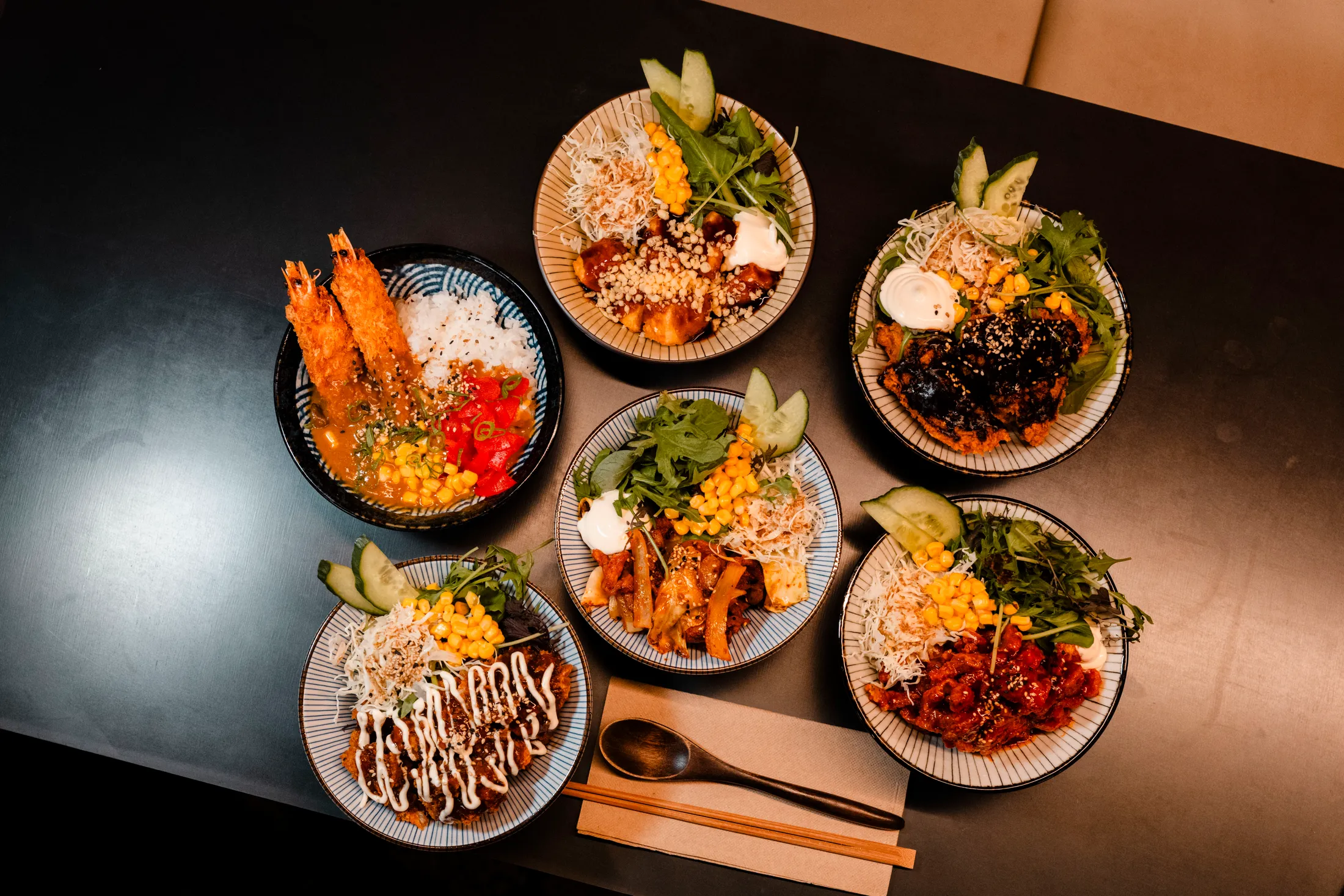 A spread of WATDA Korean dishes